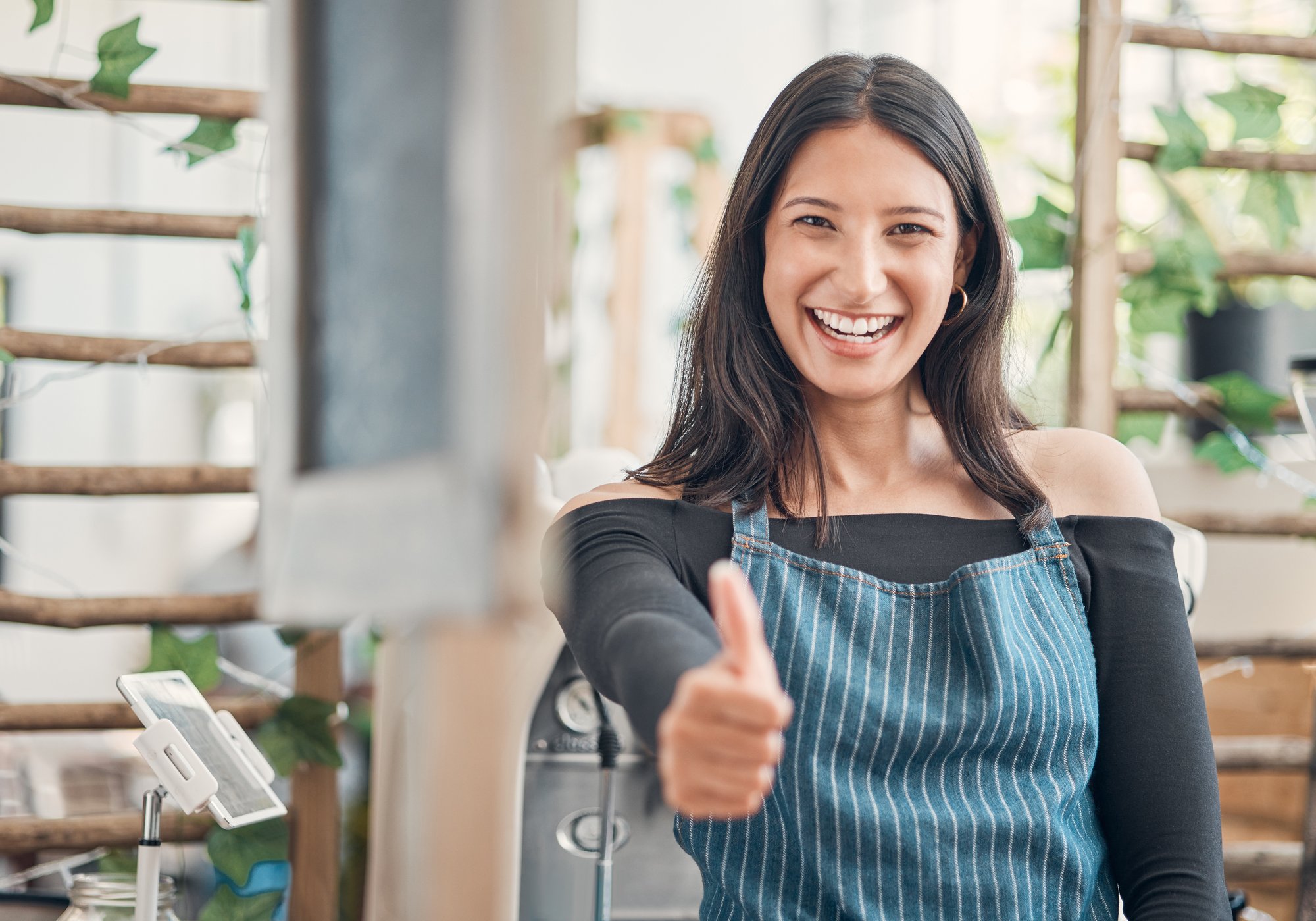 portrait-of-one-happy-young-hispanic-waitress-show-2025-04-06-11-04-22-utc